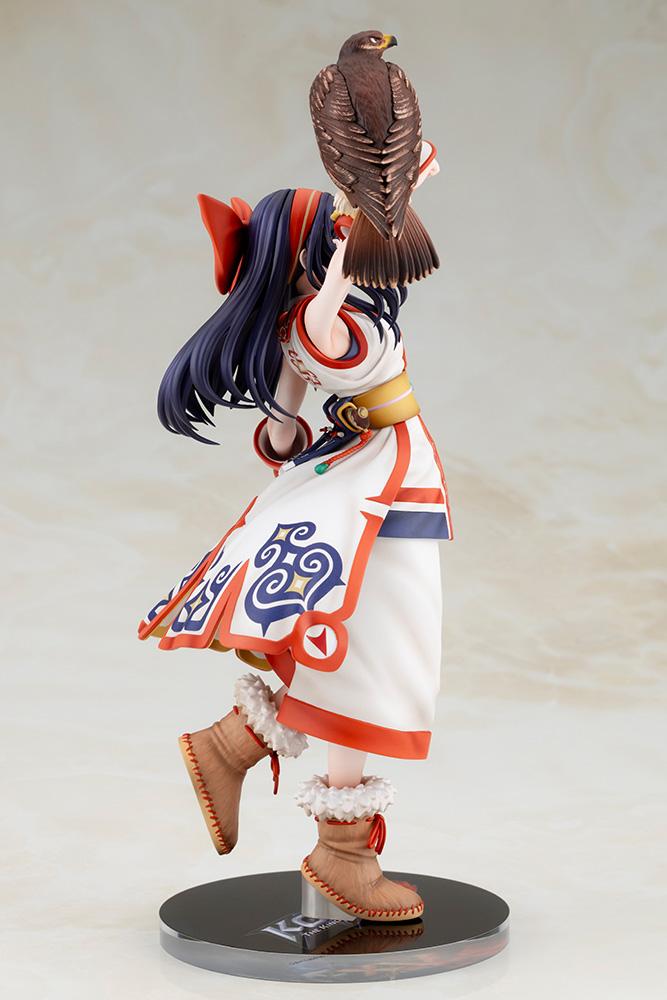 Left side view of Nakoruru figure looking upward toward her hawk Mamahaha perched on her arm