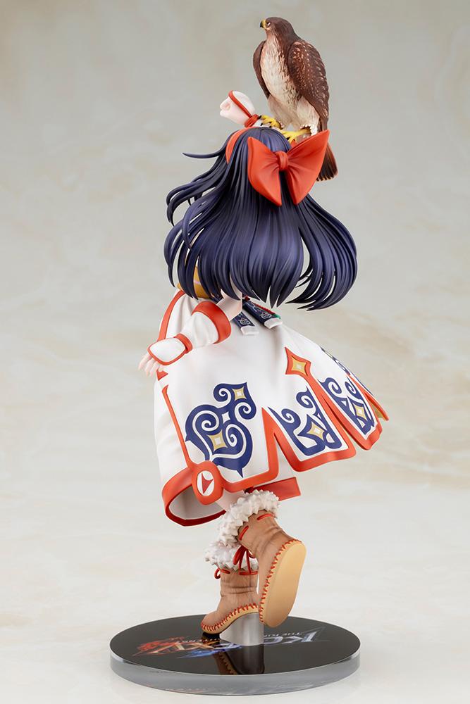 Rear three-quarter view of Nakoruru 1/8 figure highlighting the intricate blue and red coat pattern and large red hair bow