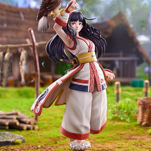 Full figure shot of Nakoruru standing on green grass in a natural village diorama setting