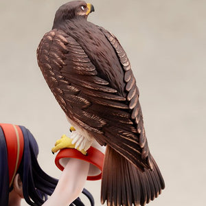 Detailed close-up shot of hawk Mamahaha with realistic feather texturing perched on Nakoruru's gloved wrist