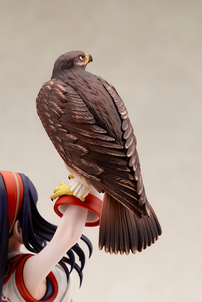 Detailed close-up shot of hawk Mamahaha with realistic feather texturing perched on Nakoruru's gloved wrist