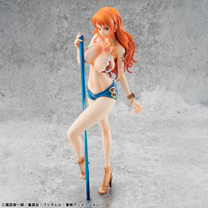 Rear three-quarter view of the Nami figure posed within a dramatic coastal diorama setting, highlighting the elegant curve of her hair.