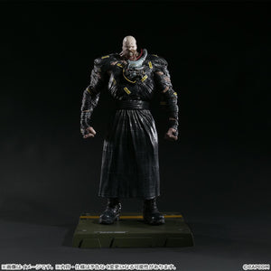 Full-length front view of the Nemesis Creator's Model figure standing on its base against a dark, dramatic background.