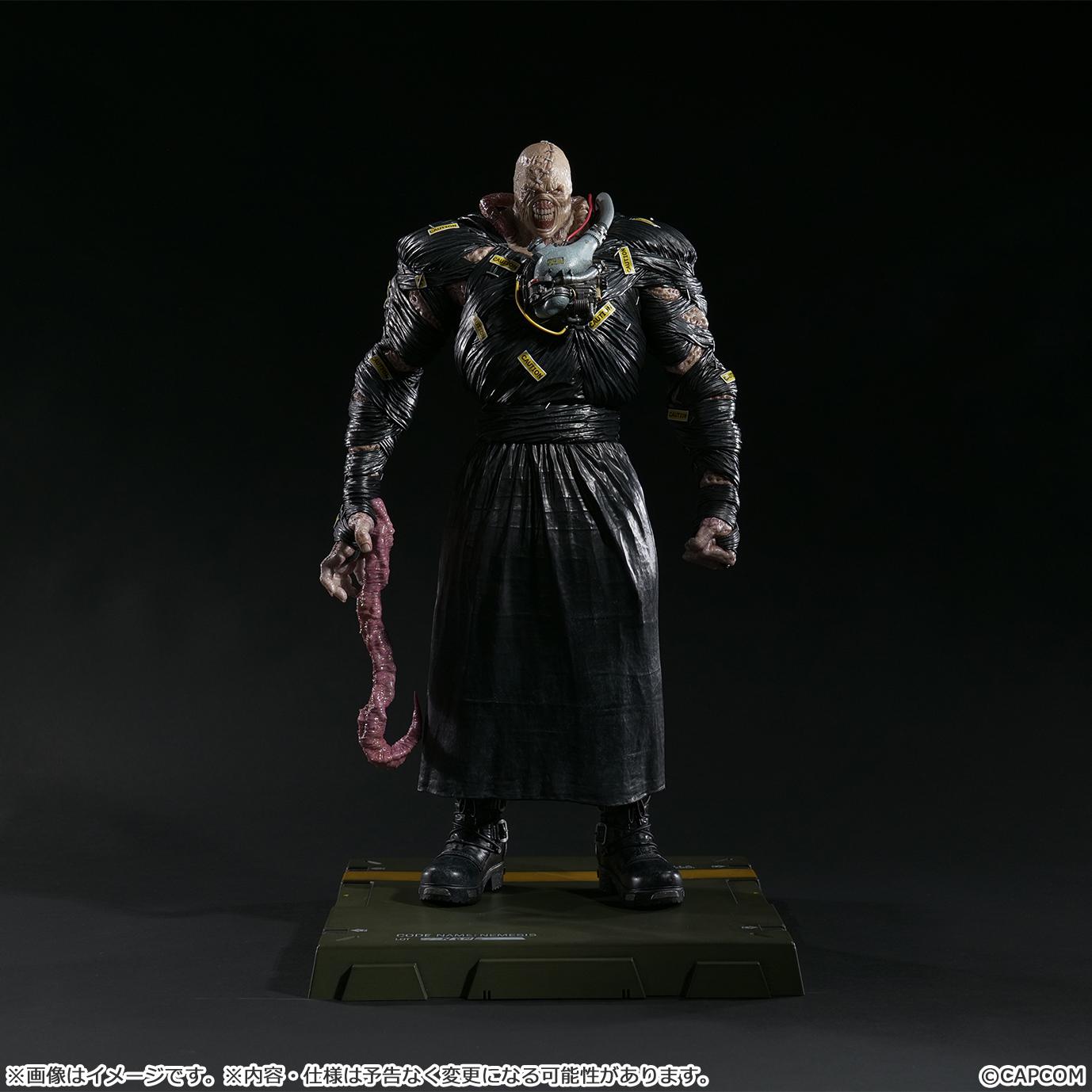 Full front view of the Nemesis figure using the alternate head sculpt and the tentacle arm accessory.