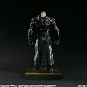 Rear view of the 1/6 scale Nemesis figure showing the detailed caution tape accents and the structural design of the back wrappings.