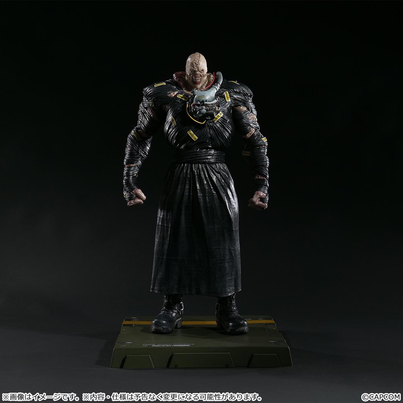 Close-up of the Nemesis figure featuring the additional interchangeable head part with an aggressive, open-mouthed expression.