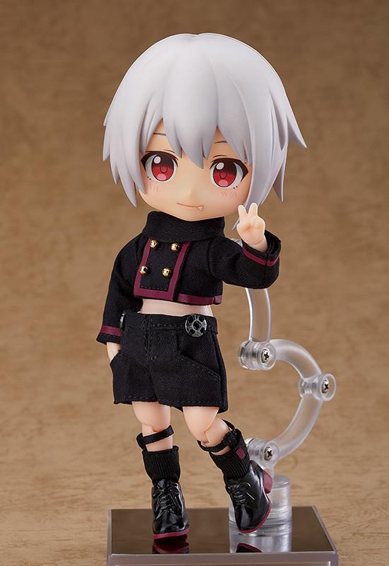 The Berg Nendoroid Doll striking a peace sign pose on one leg, displayed without his removable horns, wings, and outer skirt to show the black shorts underneath.