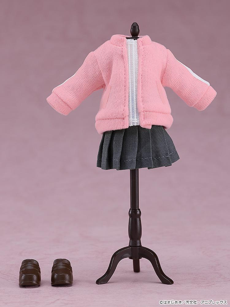 Fabric clothing pieces of the Hitori Gotoh Nendoroid Doll displayed on a miniature black apparel mannequin stand with brown loafer shoes underneath.