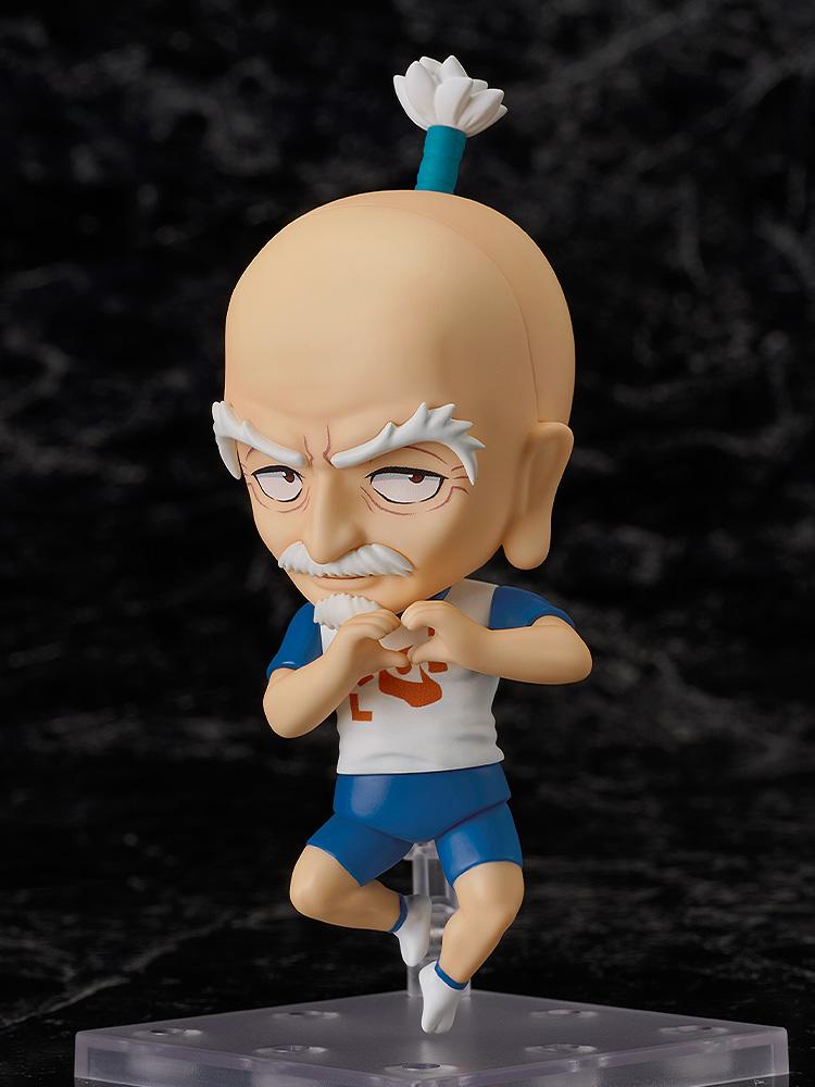 The Hunter x Hunter Nendoroid Netero figure floating on its clear stand and forming a heart shape with his hands.