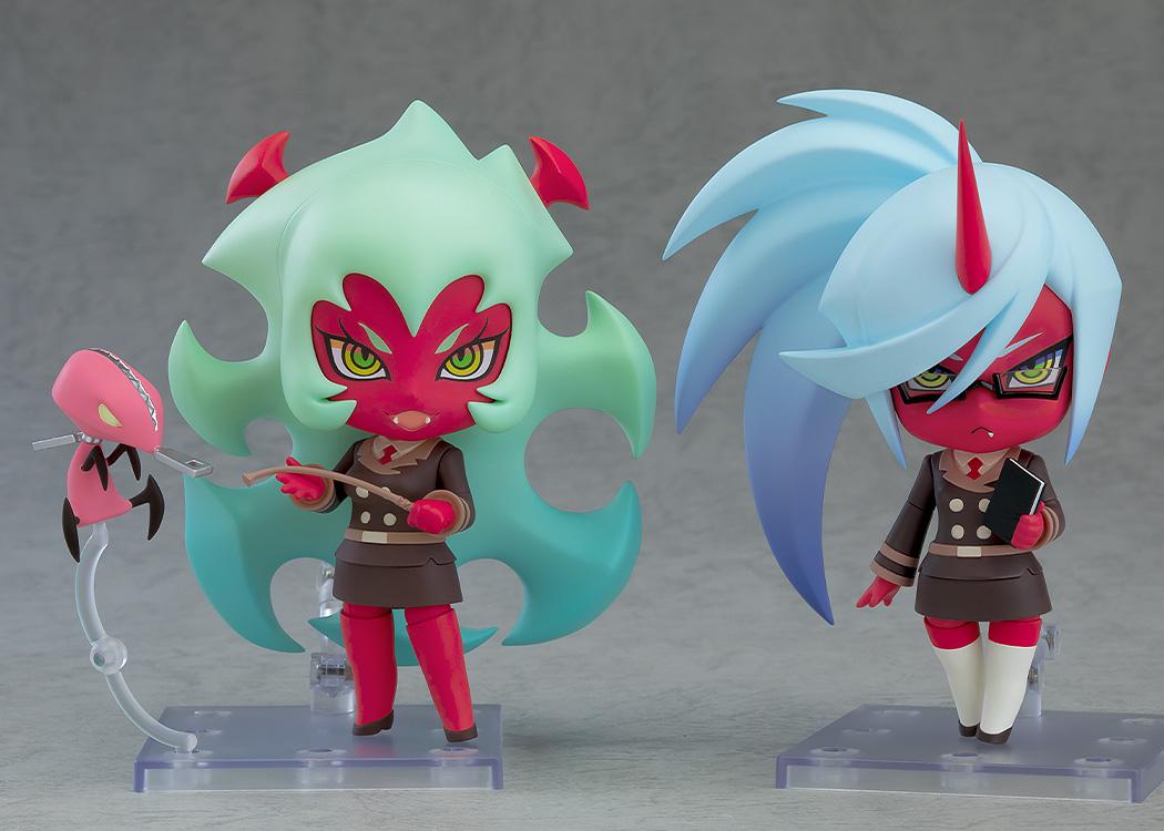 Kneesocks Nendoroid figure displayed side-by-side on clear square bases with the matching green-haired Nendoroid Scanty anime figure.
