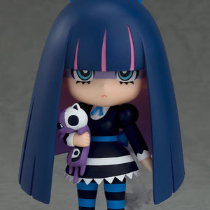 Stocking Nendoroid figure holding her purple and white plush cat companion Honekoneko while wearing blue and black striped stockings.