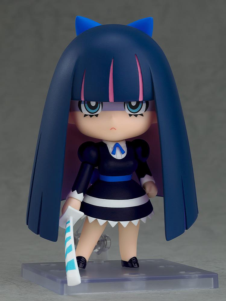 Full body view of the Stocking New Ver. Nendoroid collectible action figure on a clear display stand holding her signature Stripe sword.