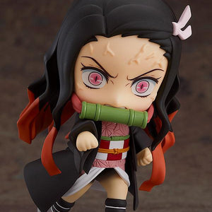Nezuko Kamado Nendoroid featuring the ghastly demon face plate with forehead veins in a dynamic combat pose.