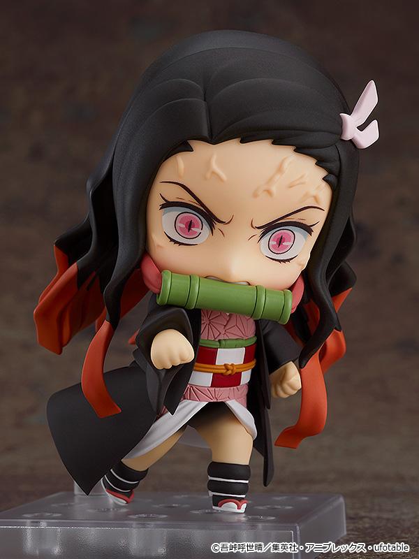 Nezuko Kamado Nendoroid featuring the ghastly demon face plate with forehead veins in a dynamic combat pose.