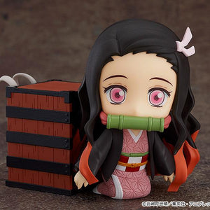 Nezuko Kamado Nendoroid in a kneeling pose next to the included Cloud Mist Pine box accessory.