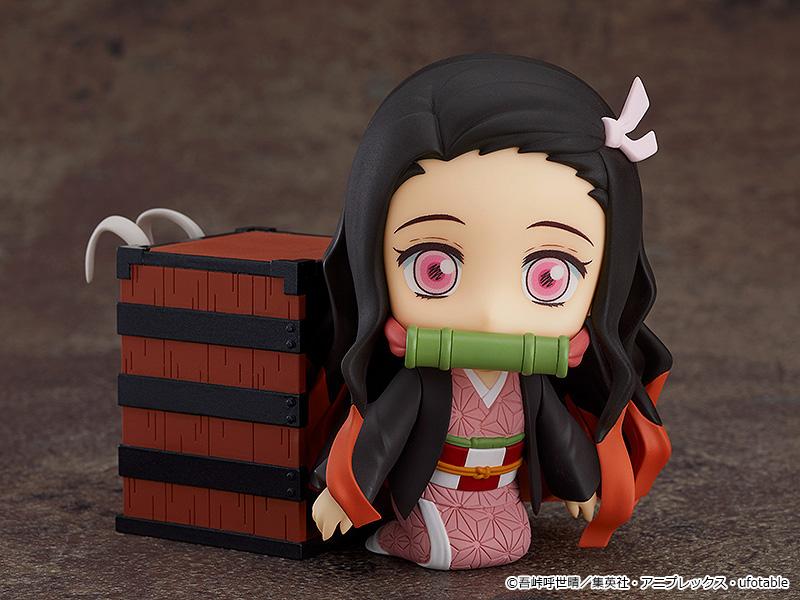 Nezuko Kamado Nendoroid in a kneeling pose next to the included Cloud Mist Pine box accessory.