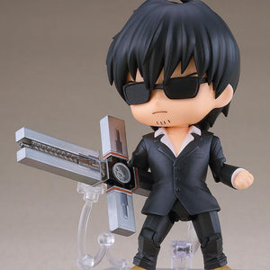 Nicholas D. Wolfwood Nendoroid wearing dark sunglasses and wielding the Punisher cross weapon in its deployed combat state.