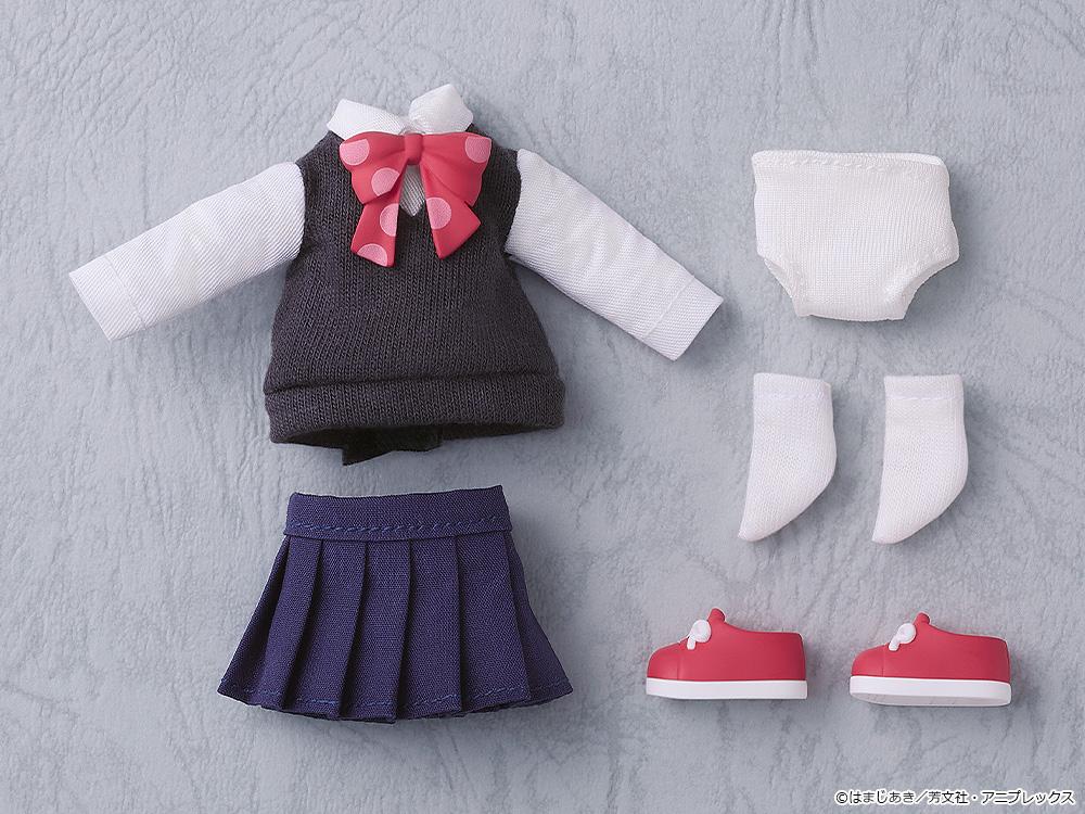 Flat lay view of the complete fabric box contents for the Nijika Ijichi Nendoroid Doll, including the uniform vest, shirt, pleated skirt, underwear, white socks, and red shoes.