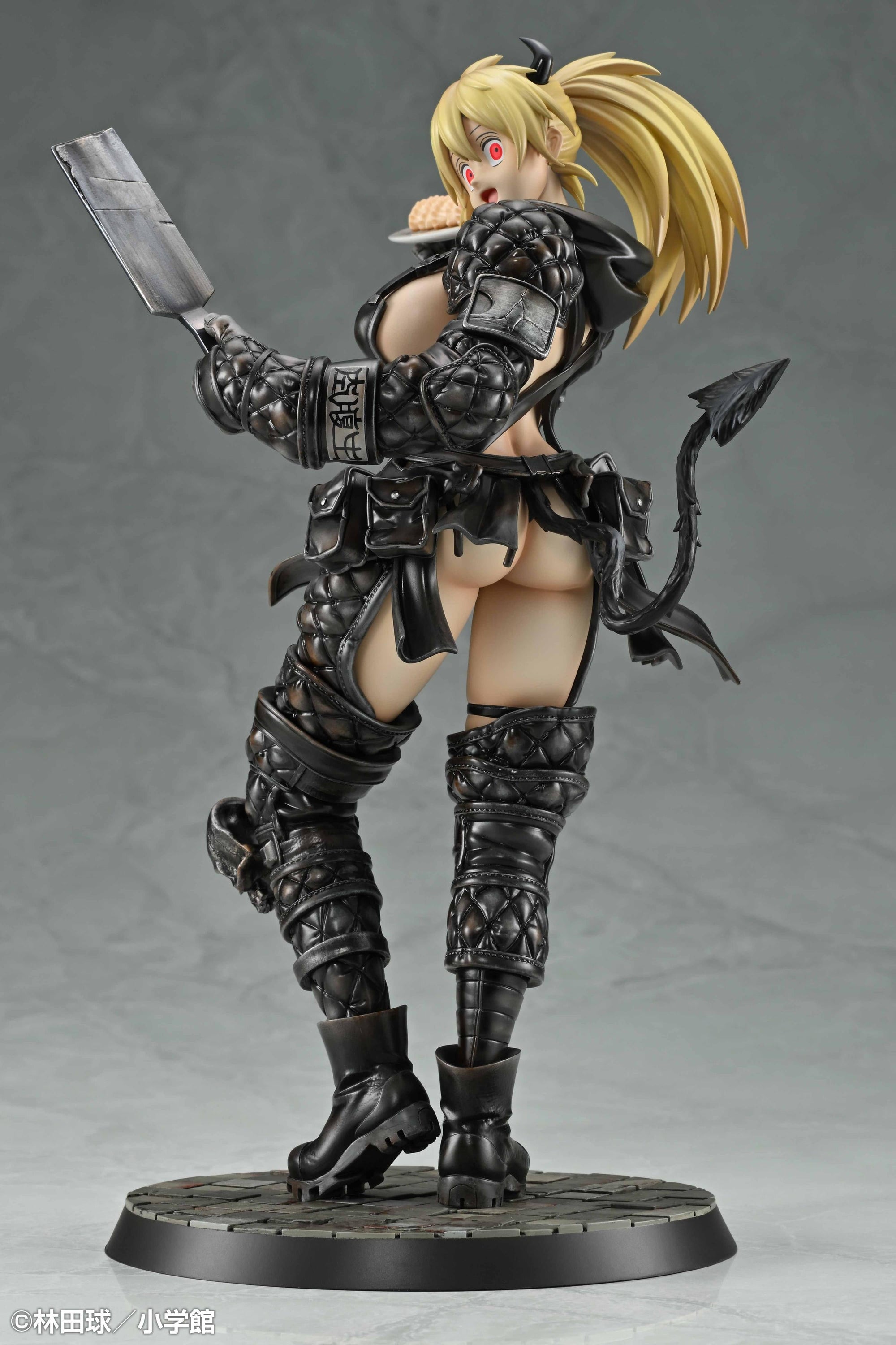 Rear angle shot focusing on Nikaido's blonde hair and the intricate straps of her dark leather-look armor.