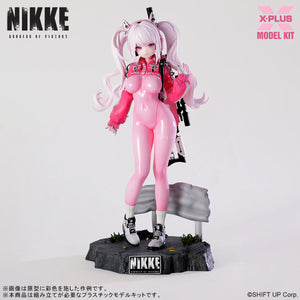 Front view of the assembled Alice model kit from Goddess of Victory: Nikke, featuring her pink bodysuit and signature twin-tail hair.