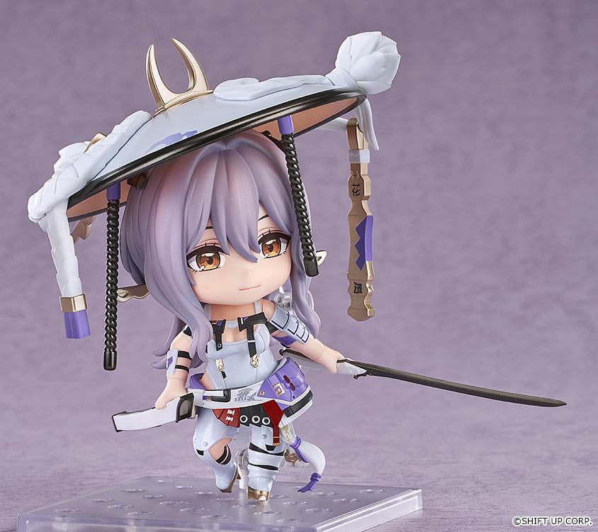 Action combat pose of the Nikke Scarlet Nendoroid action figure wielding her unsheathed Fleetly Fading katana sword.