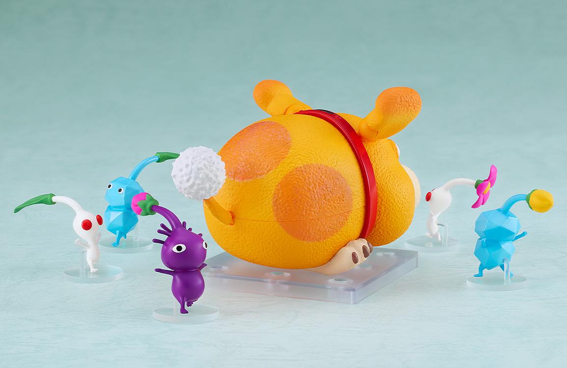 Rear view of the Oatchi Nendoroid showing the orange spot patterns and fluffy white pom-pom tail.