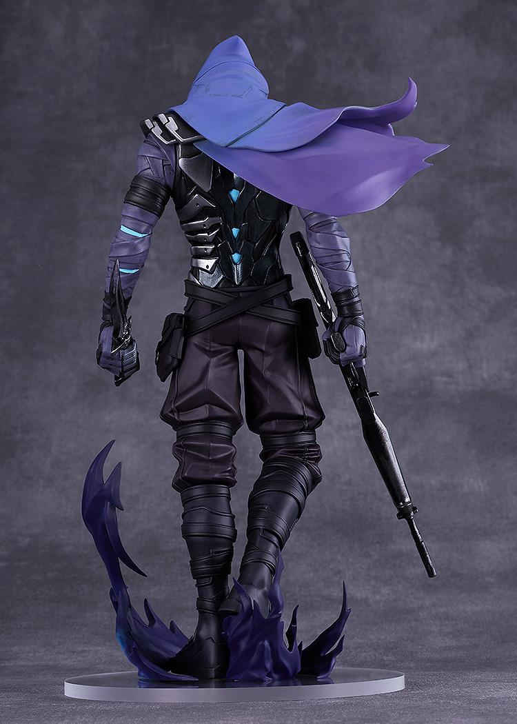Back view of the Omen figure showing the intricate sculpt of his cape and the specialized base with dark energy effects.