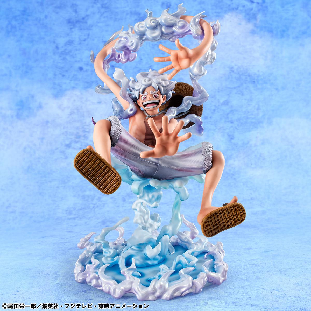 Luffy Gear 5 action statue in a dynamic mid-air pose with cloud effect parts.