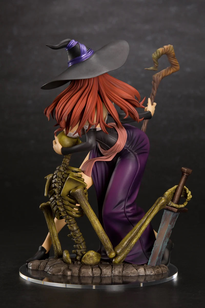 Rear view of the Sorceress figure with her hat on, showing the flowing red hair, purple skirt, and the skeleton holding a rusty sword.