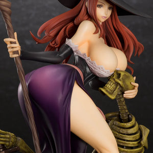 A close-up of the Sorceress figure with her hat on, highlighting the detailed face, long red hair, and the reanimated skeleton base.
