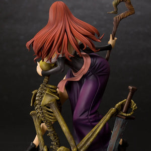 Rear three-quarter view of the Sorceress figure without her hat, showing the deep purple skirt and the cursed sword in the skeleton's hand.