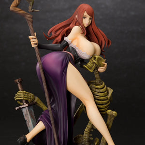 Full front view of the Orchid Seed Sorceress figure without her hat, posing with her staff and cradling the skeleton's head.