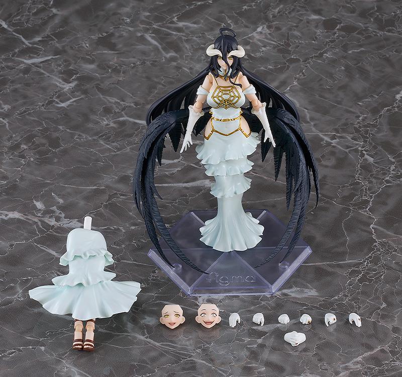 Figma Overlord Albedo action figure displayed on stand alongside included extra face plates, hand parts, and interchangeable skirt piece.