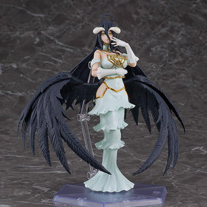 Overlord figma Albedo action figure standing in her white dress with large black feathered wings extended on a dark studio base.