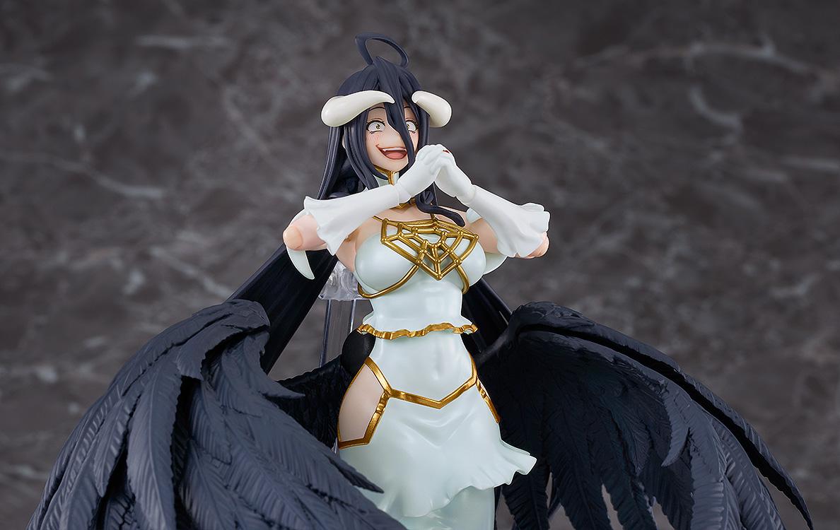 Close-up shot of the figma Albedo figure displaying her excited euphoric facial expression and clasped hands.