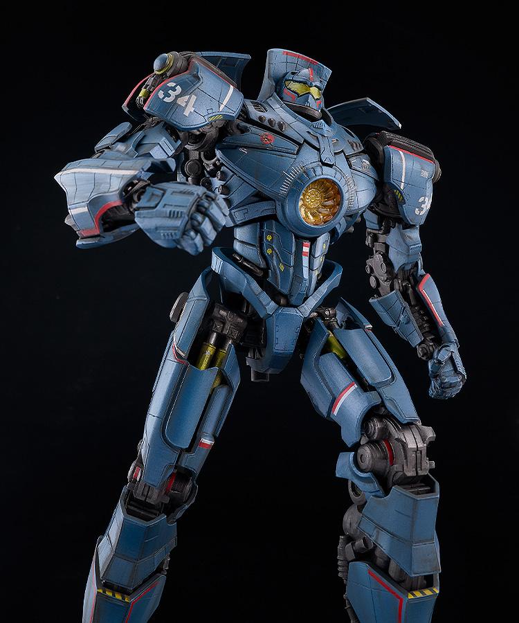 Low-angle close-up view of MODEROID Gipsy Danger model kit highlighting the nuclear vortex chest turbine and shoulder decal 34.
