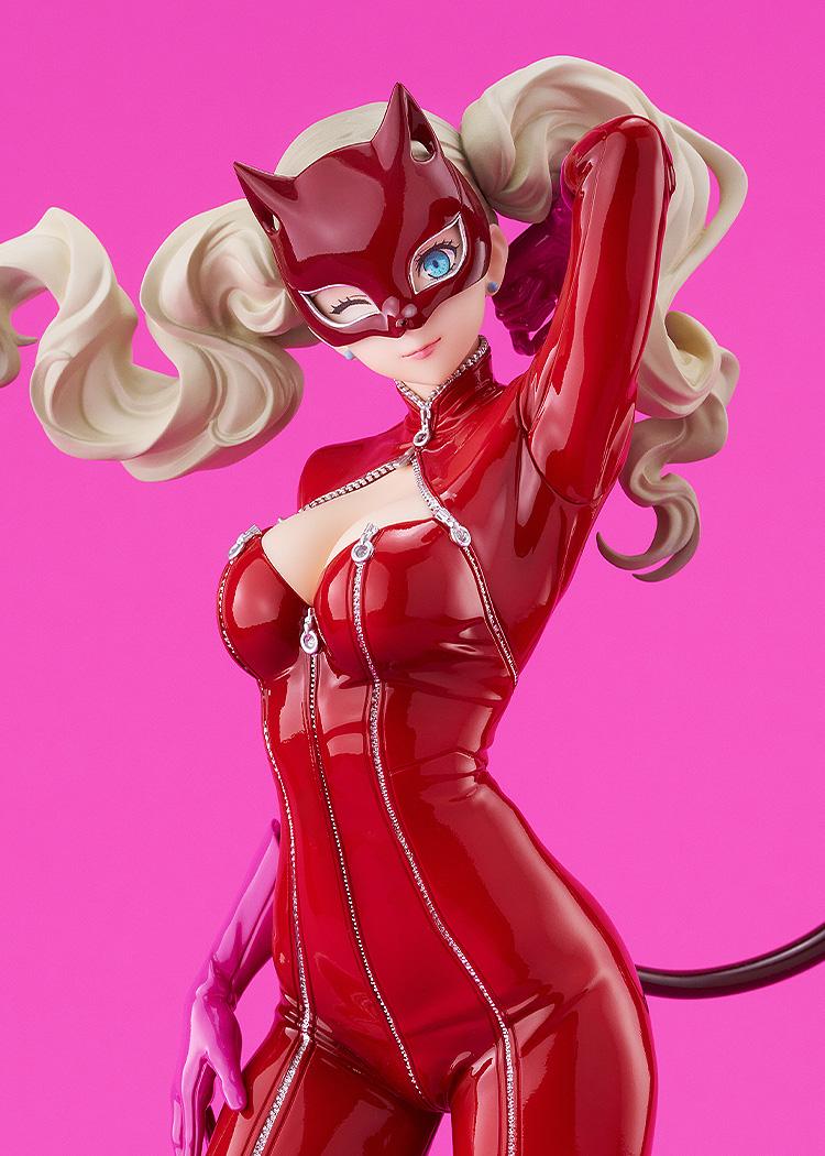 A close-up shot of the Panther figure's face, showing her blue eyes, red mask, and the detailed zipper work on her Phantom Thief attire.