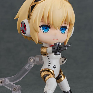 Nendoroid Aigis 2.0 figure in a dynamic pose holding the included machine gun accessory.