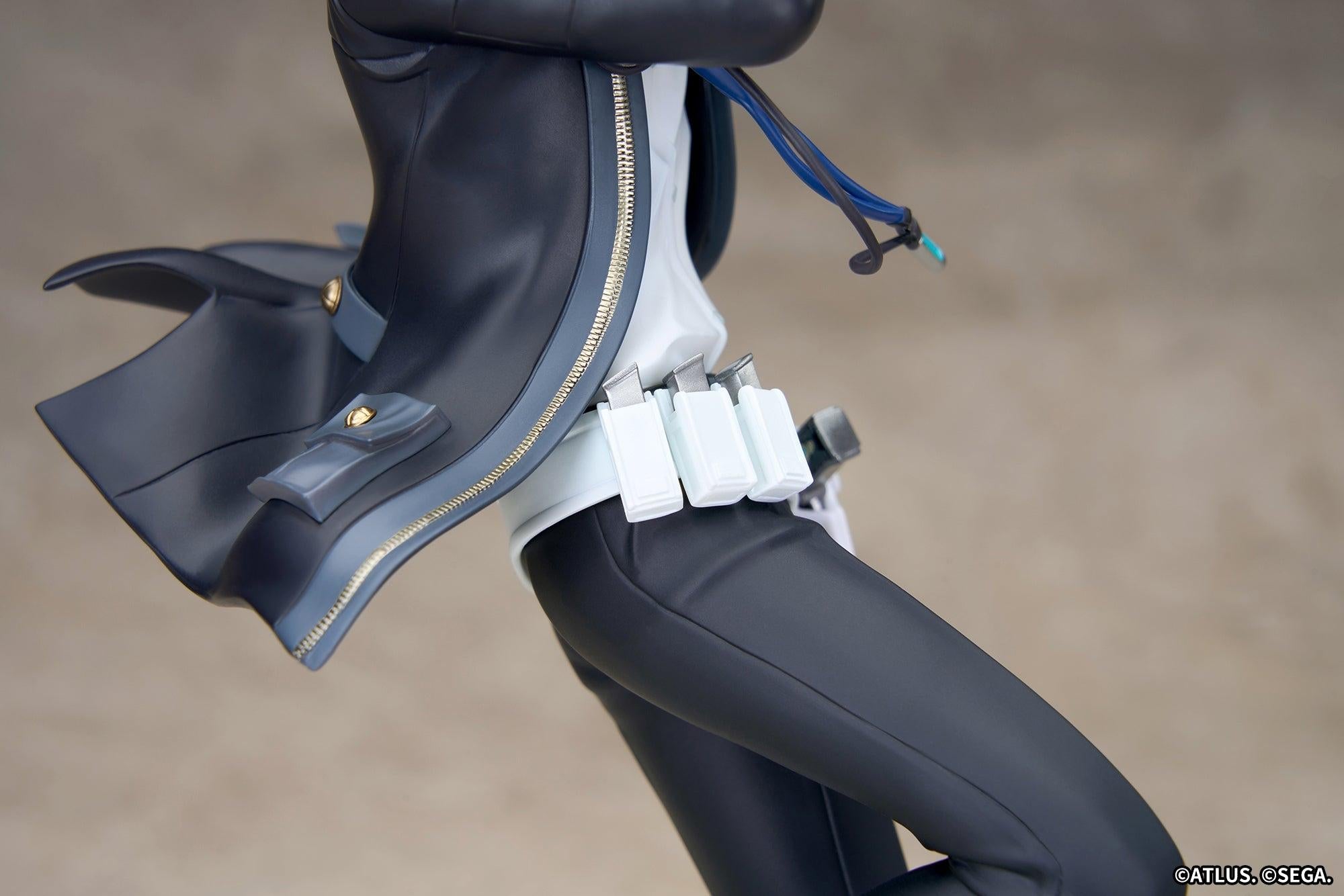 Detailed view of the white magazine pouches and flowing black combat jacket edge on the Persona 3 Reload Protagonist figure.