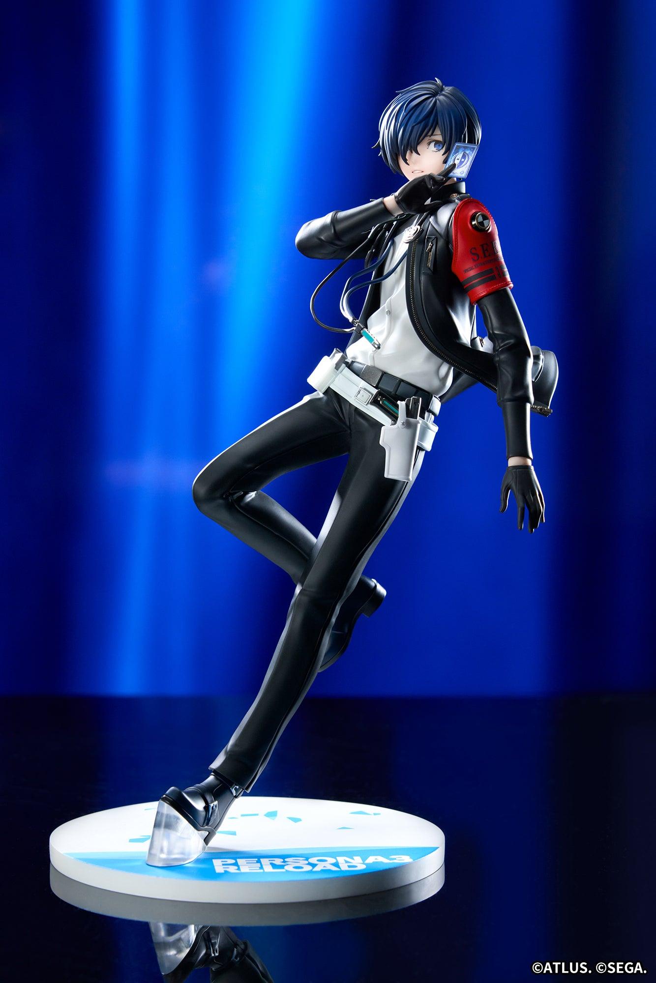 Promotional full-body photo of the Persona 3 Reload Protagonist figure posed dynamically under dramatic blue stage lighting.