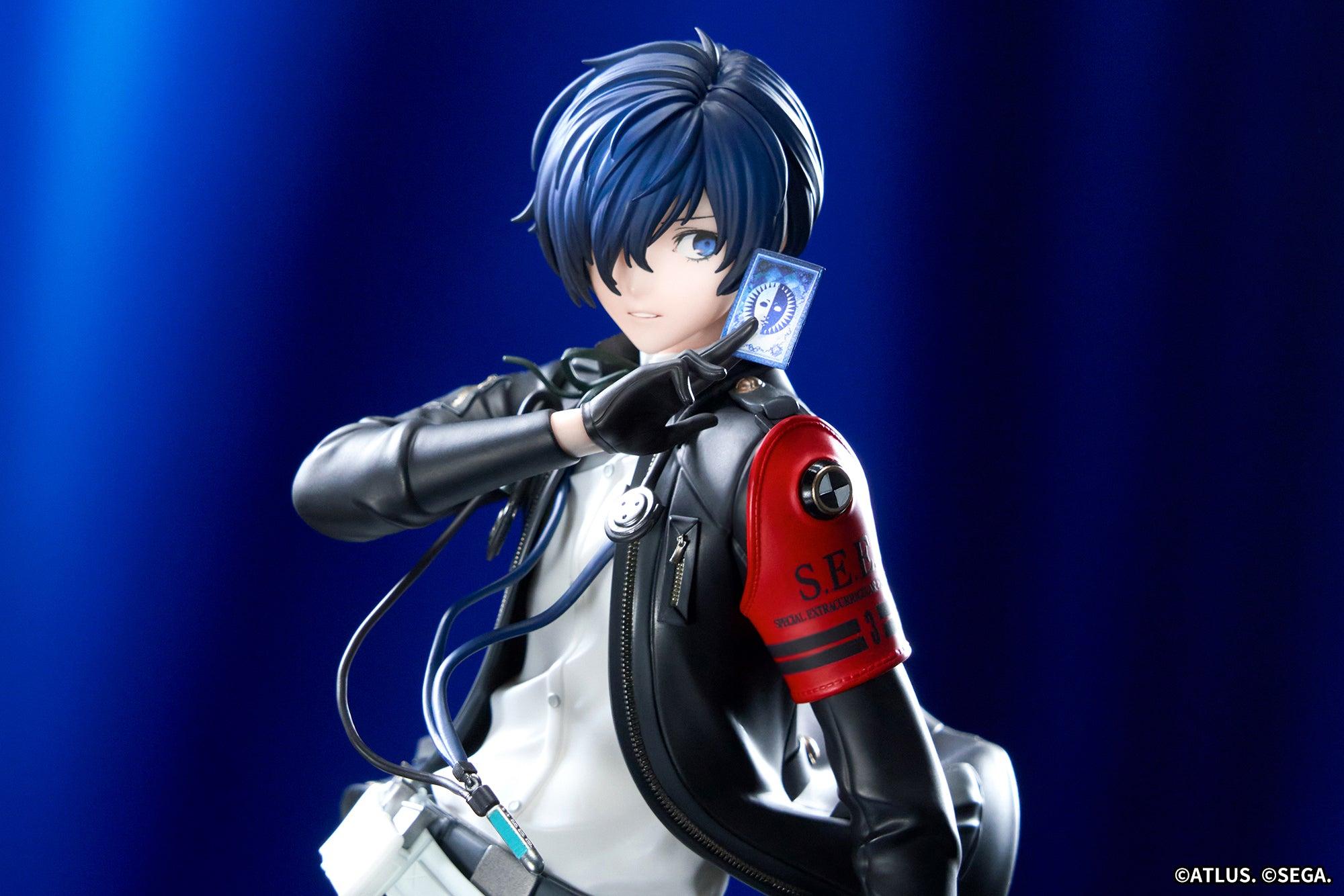 Macro portrait of the Persona 3 Reload Protagonist figure looking forward while holding a tarot card before a blue background.