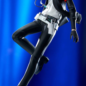 Low-angle photo of the Persona 3 Reload Protagonist figure focusing on the sculpted legs, holster, and logo base in blue light.