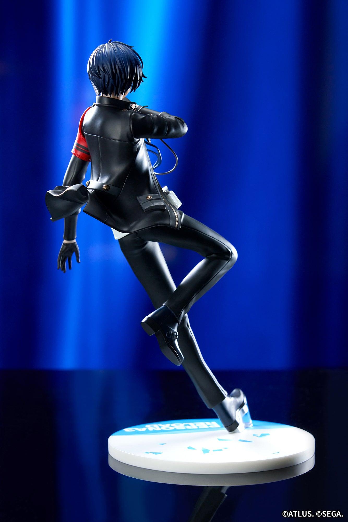 Rear full-length display of the Persona 3 Reload Protagonist figure highlighted by cool blue theatrical lighting.