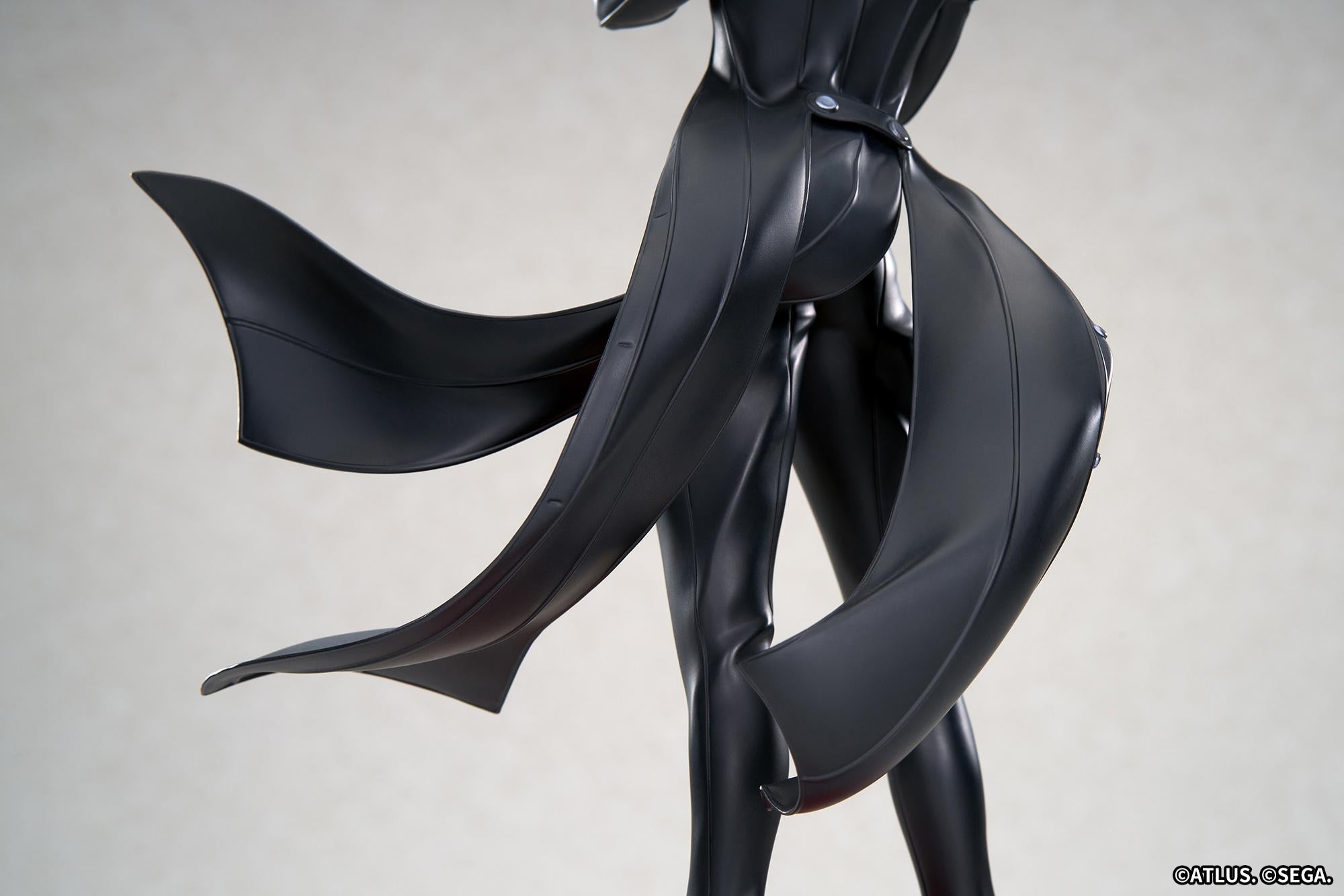 Macro view from behind highlighting the sleek sculpt and split tail engineering of Joker's signature long black coat.