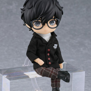 Highly articulated P5R protagonist Nendoroid Doll shown in a relaxed sitting position on a clear block.