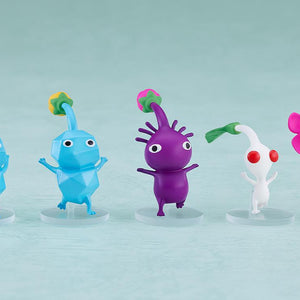 A lineup of the included Pikmin accessory figures, including Blue, Purple, and White Pikmin in various stages of growth.