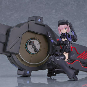 Casual pose of the PLAMATEA Mash Kyrielight Ortinax figure sitting on top of the compact Black Barrel module.