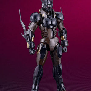 Front view of the Guyver 03 model kit standing with high-frequency swords retracted, highlighting the detailed mechanical joints.