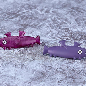 Close-up of the purple and dark-grey mechanical fish drone accessories included with the Sophia F. Shirring Vampire Ver. kit.