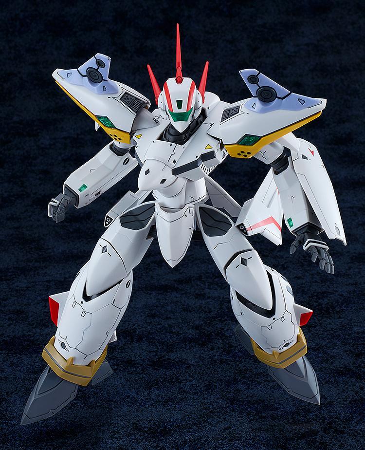 Front view of the white and red VF-19P Excalibur Battroid mode plastic model kit in a dynamic ready stance against a dark textured studio background.